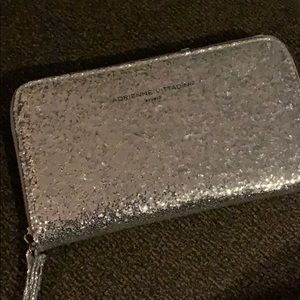 Clutch that has charger for smart phone inside